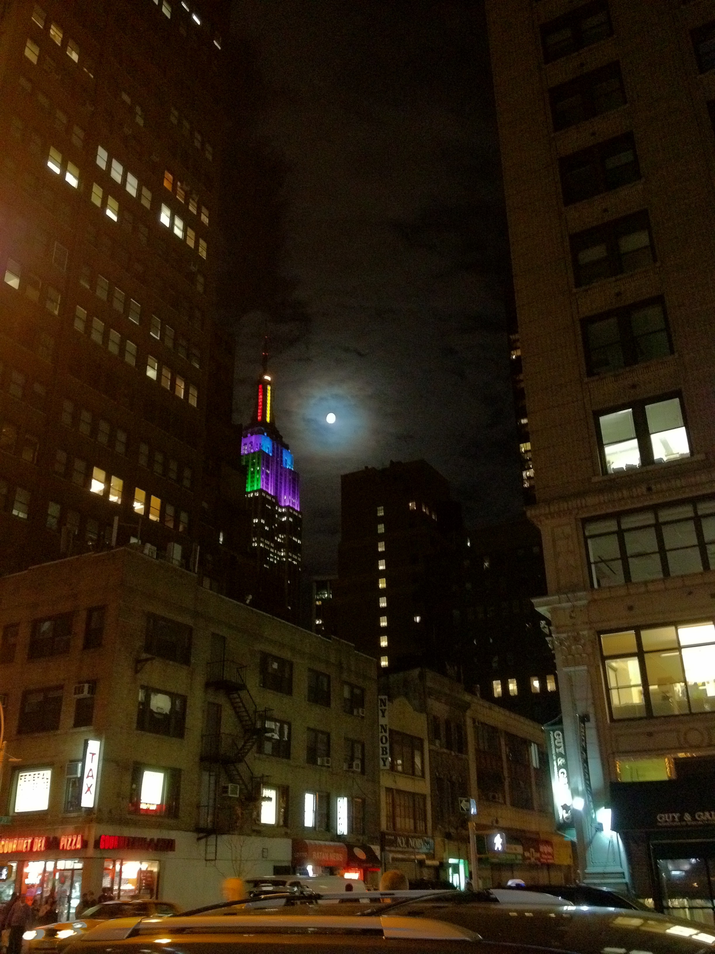 Cool picture of an almost full moon and the Empire State Building